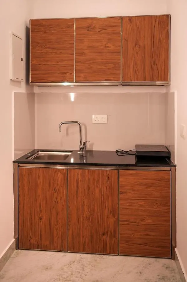 Quarto em Acomodações Particulares Redstone Villa Calecute