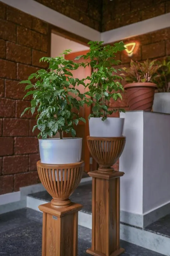 Δωμάτια σε οικογενειακή κατοικία Redstone Villa Kozhikode